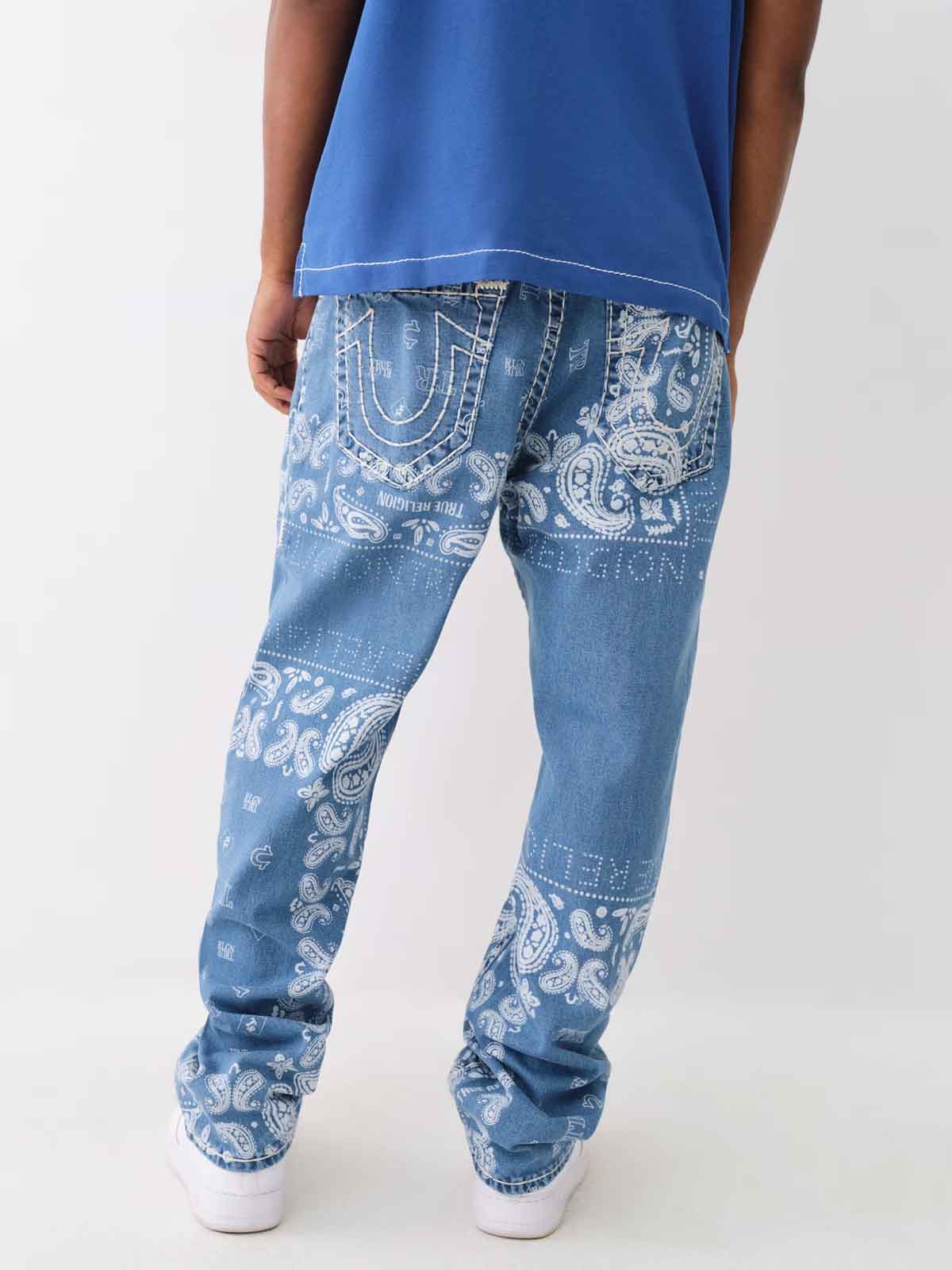 True religion light wash jeans with white paisley detailing